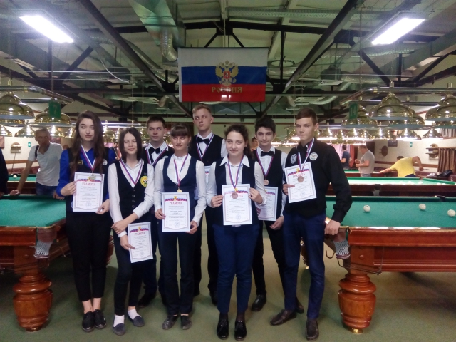 победители